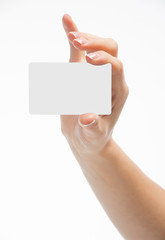 Hand holding an empty business card, în white background