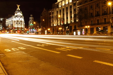 Naklejka premium Gran via street in Madrid, Spain at night
