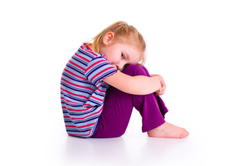 little girl with sad expression