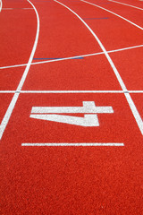 Fototapeta premium Number 4 on the start of a running track