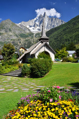 Les Praz de Chamonix and Aiguille Dru mountain