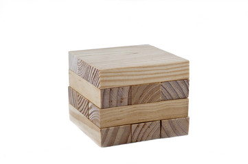 Wooden blocks make a cube on the white background