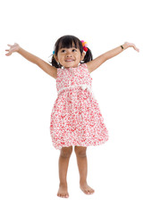 girl in studio with arms outstretched