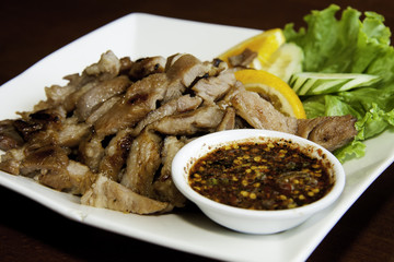 Thai style grilled pork with spicy sauce