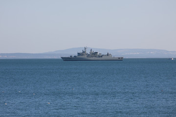 Fototapeta na wymiar Military ship in the open sea