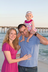 Fototapeta na wymiar Happy Family At Beach