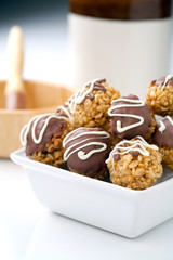 Bowl of chocolate covered treats.