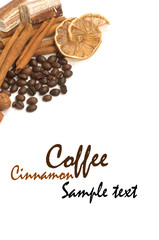 Coffee beans, cinnamon, lemon and sweets over white