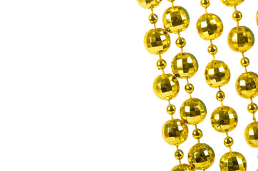 Background made of a brilliant celebratory beads of golden color