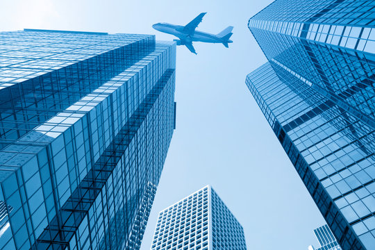 airplane with modern building