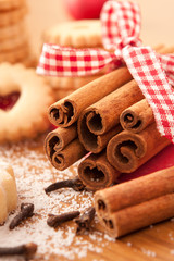 Cinnamon sticks with Christmas cookies