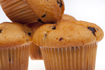 Three chocolate muffins isolated on a white