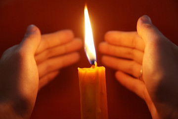 Candle light and hands