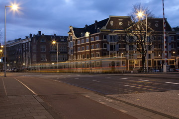 Fototapeta na wymiar Busy Amsterdam Street at Sunrise
