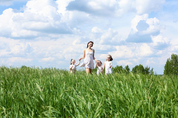 family with children in summer day outdoors