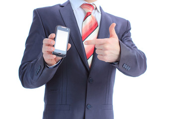 Businessman showing and handing a mobile phone.