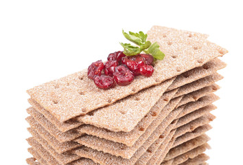 stack of crispbread reflection, blueberry red, green leaf