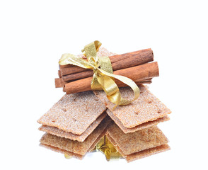 Cinnamon sticks ,stack of crispbread ,reflection,