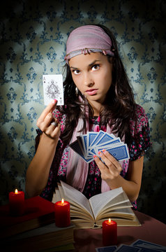 Fortune-teller predicing the cards