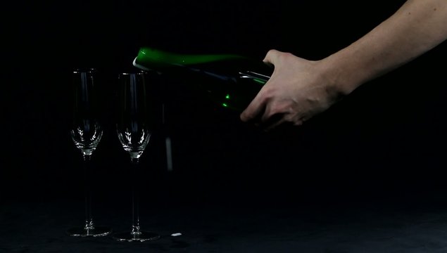 Opening a bottle of champagne with a knife (sword)