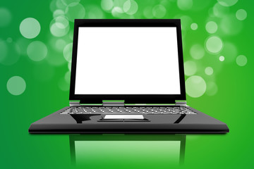 Laptop isolated on a green background