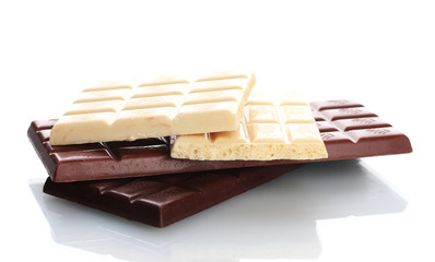 Bar of milk, dark and white chocolate isolated on white