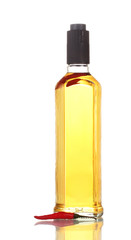 bottle of pepper vodka and red chili pepper isolated on white