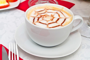 Coffee cappuccino in white cup