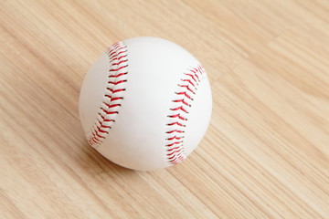 Baseball with wood background