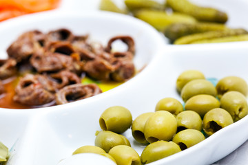 Appetizer with anchovies and olives