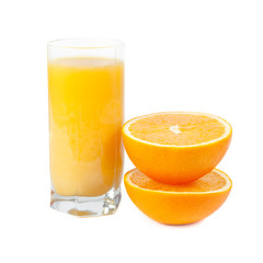 A glass of orange juice with fruits near