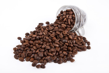 Coffee cup and grain on white background
