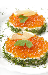 sandwiches with red caviar on white background