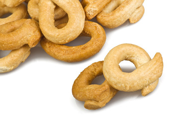 Taralli biscuit with ingredients on the white