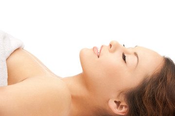 Naklejka premium beautiful woman in spa salon