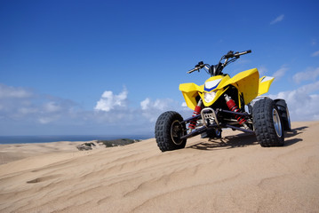 ATV Quad Racer on sand dune