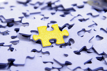 Blue puzzle with one yellow element