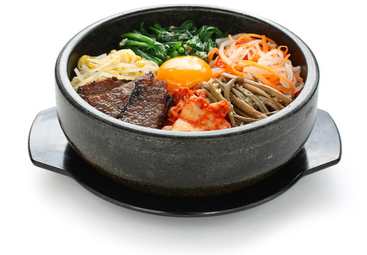 bibimbap in a heated stone bowl, korean dish