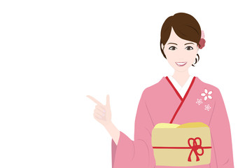 指差す着物姿の女性