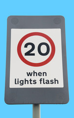 speed limit sign on blue sky background