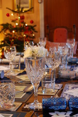 Decorated table set for Christmas dinner