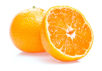 One ripe juicy tangerine and half isolated on white background