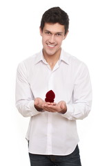 man holds a gift box jewellery for Valentines Day