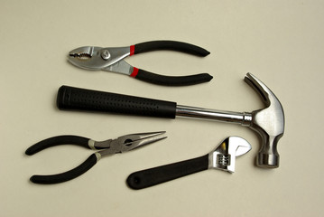 Assorted tools on a white background.