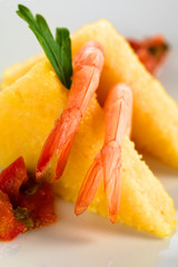Polenta with cooked shrimp and Colombian hogao sauce