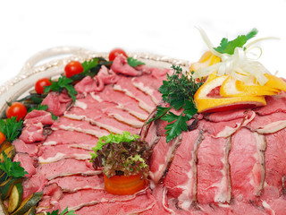 roast beef on silver platter