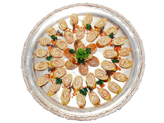 salmon wrapped in crepes platter