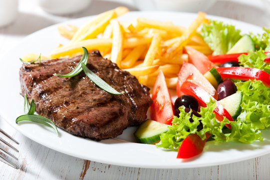 Grilled beefsteak with french fries