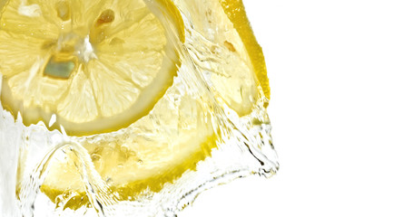 Transparent lemon slices in water splash