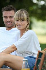 Young couple having a picnic